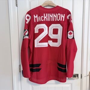 BNWT Authentic Bauer 2026 Olympics Canada Nathan MacKinnon Semi Pro Jersey 54